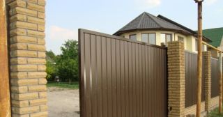 Купить откатные ворота из профнастила Лобня, цена от 1735 руб.